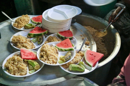 Lunch prepared at the school kitchen Somalia, rice, banana, watermelon