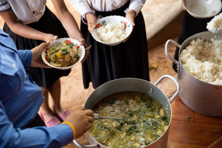 School meal in Cambodia with rice and vegetables